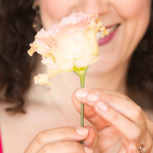 woman's hands with a flower